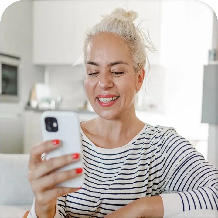 woman-on-phone-smiling-f97c1934